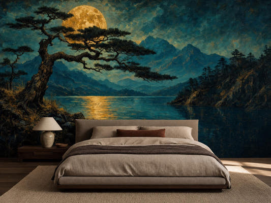 Moonlit alpine lake mural in teal and gold behind a low bed with a ceramic lamp and rust cushion