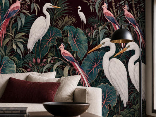 Close view of the white herons and pink birds among teal leaves, above a cream sofa with a burgundy cushion