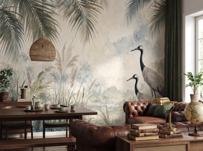 Crane marsh mural beside a window, with a dining table and a leather chesterfield