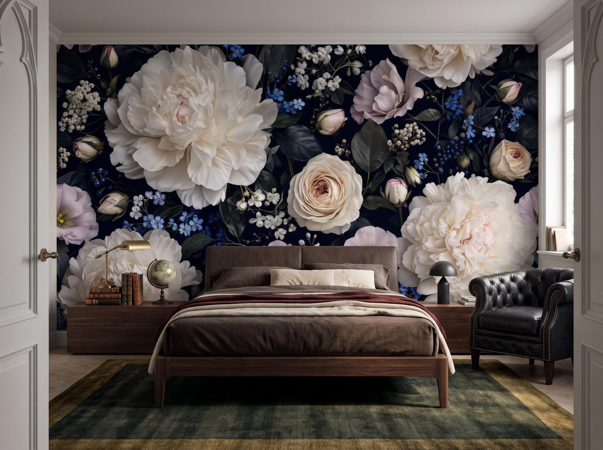 Wide bedroom with the dark peony wallpaper, a wooden bed, leather chair and patterned rug