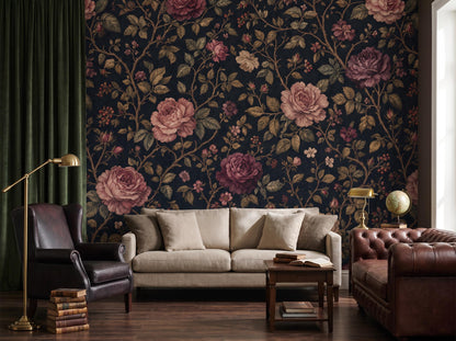 Close view of the pink and crimson roses and trailing foliage above a linen sofa