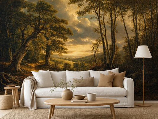 Golden pastoral woodland mural behind a white slipcovered sofa, with a round wooden table and floor lamp