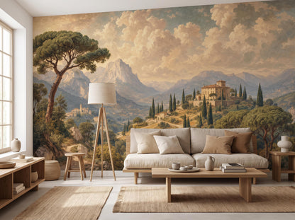 Tuscan landscape mural filling a living room wall beside a bright window, with a linen sofa and a jute rug
