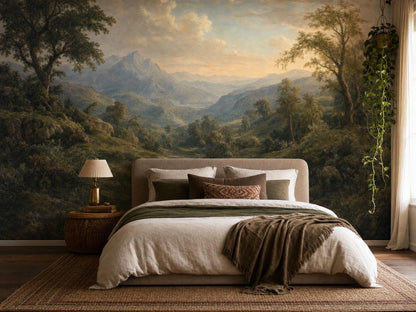 Mountain valley mural in dusty blue and green behind an upholstered bed with olive cushions