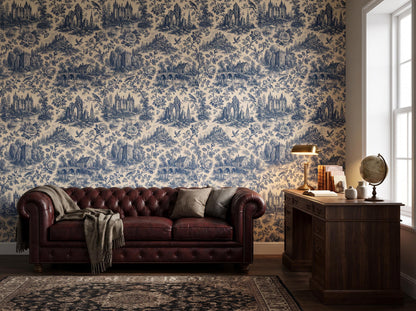 Blue toile wallpaper beside a window, with a burgundy leather sofa and a wooden sideboard
