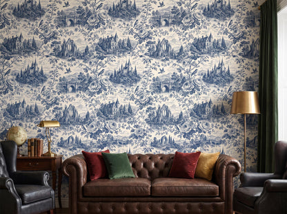 Blue and cream toile wallpaper behind a brown leather chesterfield sofa with jewel-toned cushions