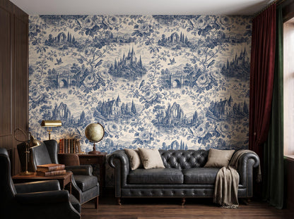 The blue toile wallpaper across a room, with a dark chesterfield sofa, red curtain and desk