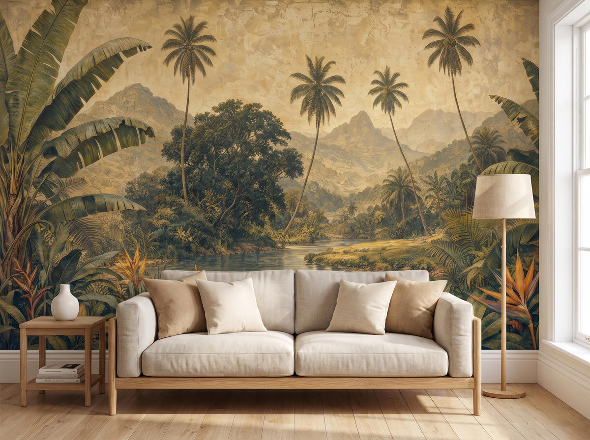Antique green jungle mural with coconut palms and distant hills behind a cream sofa and a wooden side table