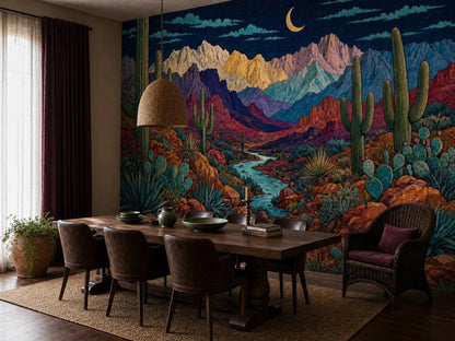 The desert mural across a dining room wall, with a wooden table, rattan pendant and curtains