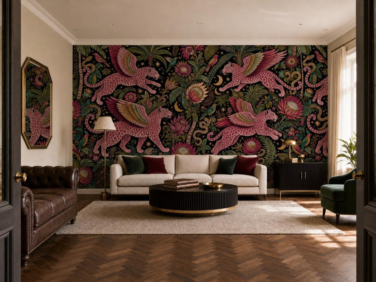 Wide room with the winged leopard wallpaper, a cream sofa, leather chair and herringbone floor